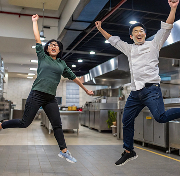 asian-singapore-man-and-woman-in-their-30-s-jump-f 1(1)